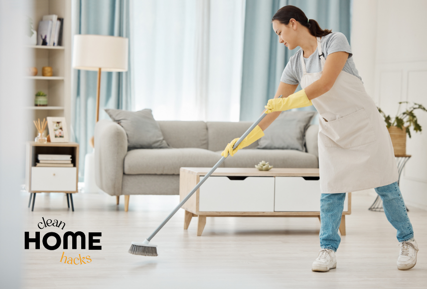 Person cleaning a bright living room